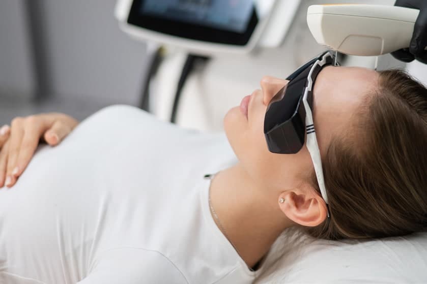 A Candela Nordlys treatment in progress, the client in protective eyewear